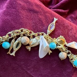 Gold Tone Sea Life Charm Bracelet Fish Shells Floats